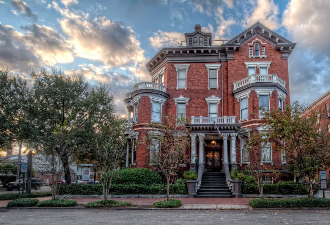 A photo of the Kehoe House during the day. Said to be one of the most haunted boutique hotels in Savannah, Georgia.