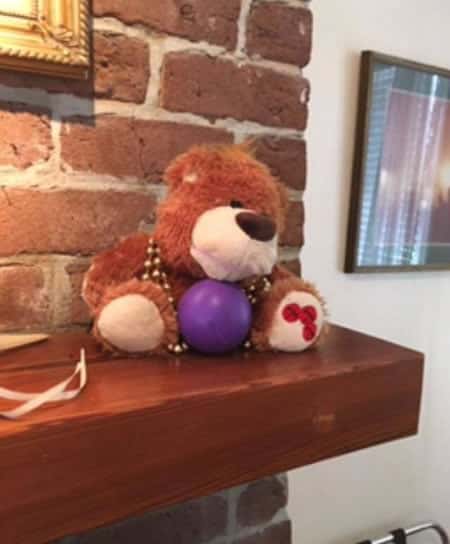 A photo of the teddy bear at the haunted 17hundred90 Inn in Savannah, Georgia, in Room 204