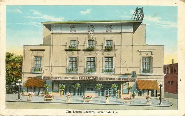 A historic postcard of the famous Lucas Theatre dated to the 1920s, located in Savannah Georgia