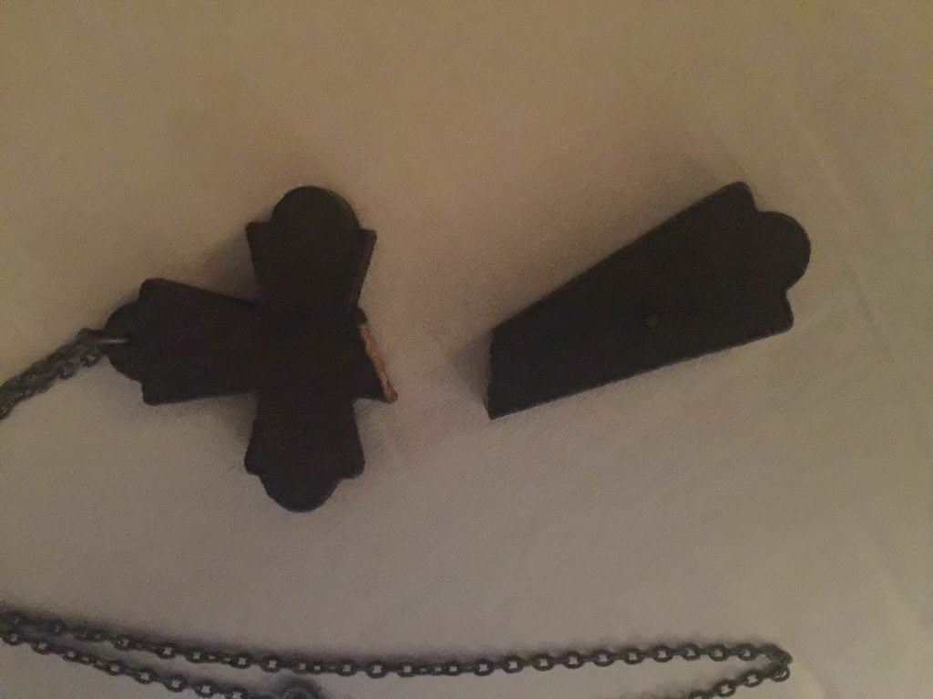 A photo of Ghost City Tour Guide Michael Bill's wooden cross, which broke during a paranormal investigation at the haunted Andrew Jackson Hotel, which is located in New Orleans Louisiana