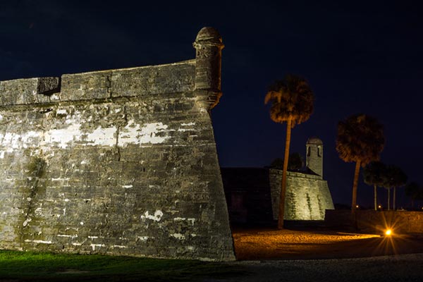 Castillo de San Marcos at night, one of the most famous haunted locations in St. Augustine
